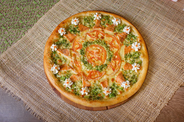 dietary pizza with broccoli and tomatoes