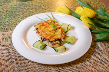 baked chicken cutlet with cheese and mushrooms