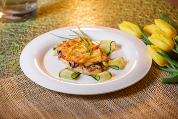 baked chicken cutlet with cheese and mushrooms