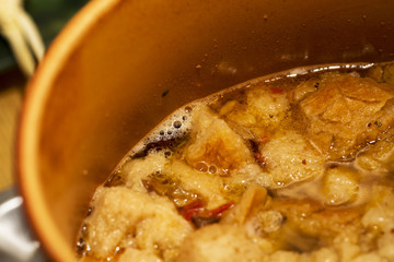 Boiling soup in a pot