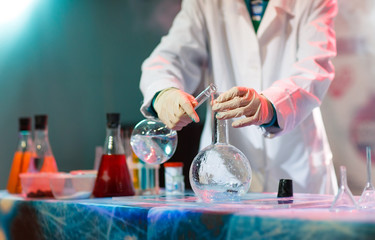Experiments in a chemistry lab. conducting an experiment in the