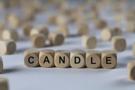 candle - cube with letters, sign with wooden cubes