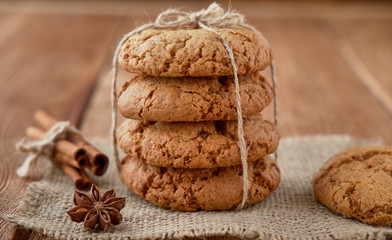 Homemade oat cookies on a wooden background