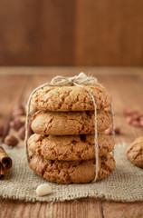 Homemade oat cookies on a wooden background