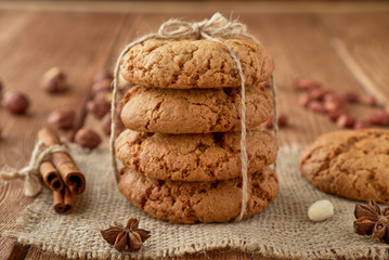 Homemade oat cookies on a wooden background