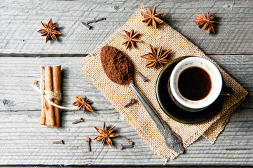 Fragrant spices, coffee, cinnamon, cloves and anise on sackcloth
