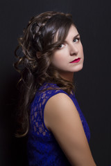 Fototapeta premium Elegant hairstyle with braids on beautiful woman.