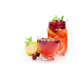 Red  fruit tea with lemon and cranberry isolated on white backgr