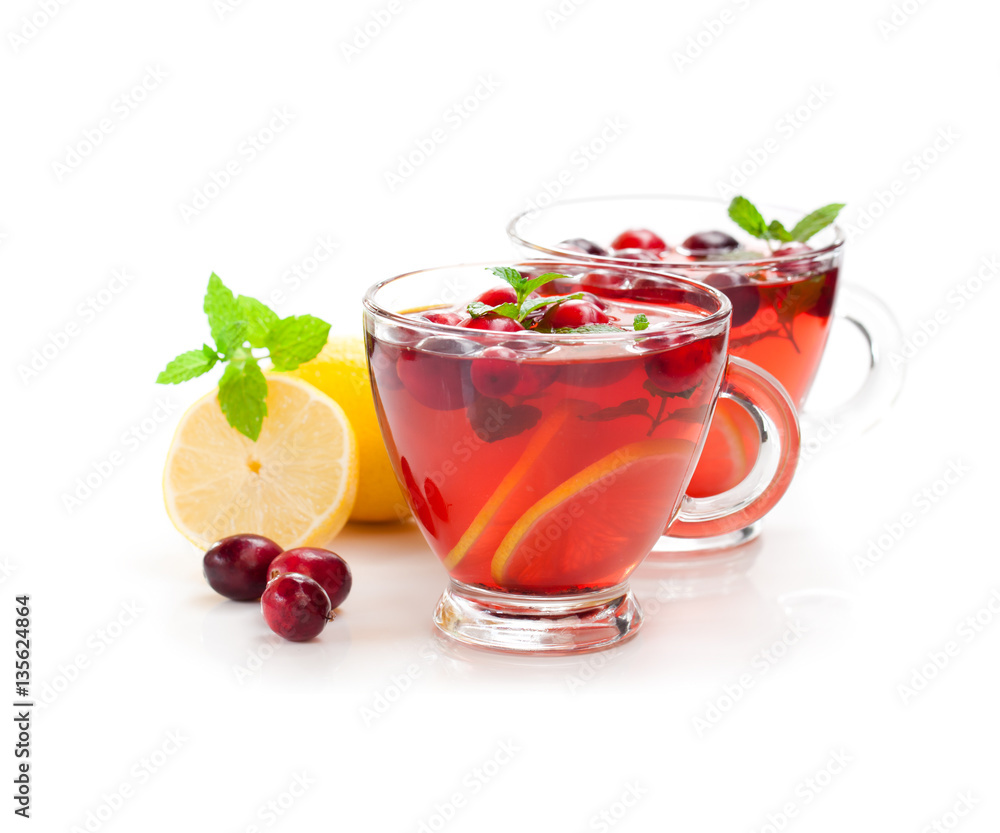 Wall mural red fruit tea with lemon and cranberry isolated on white backgr