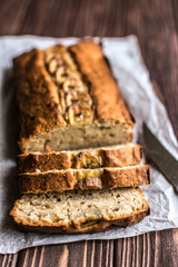 Homemade banana cake on a wooden background