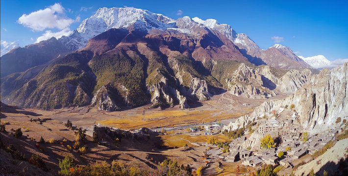 mountain view of Annapurna IV summit, in Manang area, with Bhraga village and buddhist monastery in Marsyangdi valley, on Annapurna Circuit Trek, Himalaya, Nepal, Asia