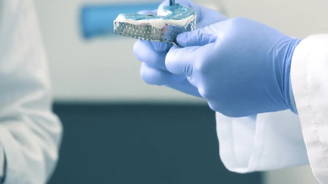 Dental prosthetist  causes the gel to the mouth guard