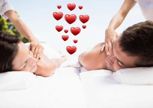 Couple receiving spa massage