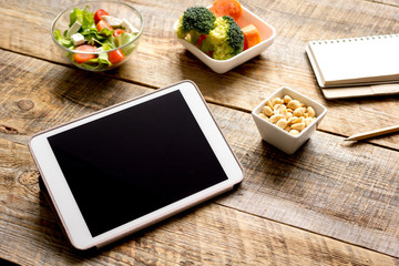 concept diet and tablet with vegetables mock up