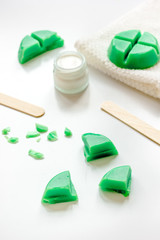 wax for depilation on white background