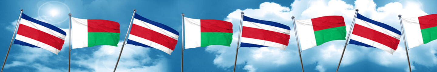 Costa Rica flag with Madagascar flag, 3D rendering