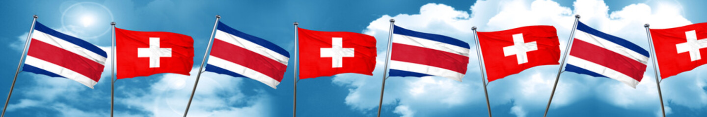 Fototapeta na wymiar Costa Rica flag with Switzerland flag, 3D rendering