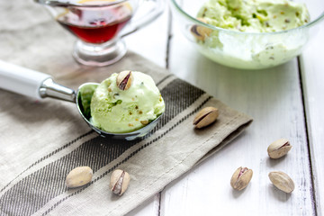 organic homemade ice cream in glass bowl on wooden background