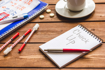concept time health check up on wooden background