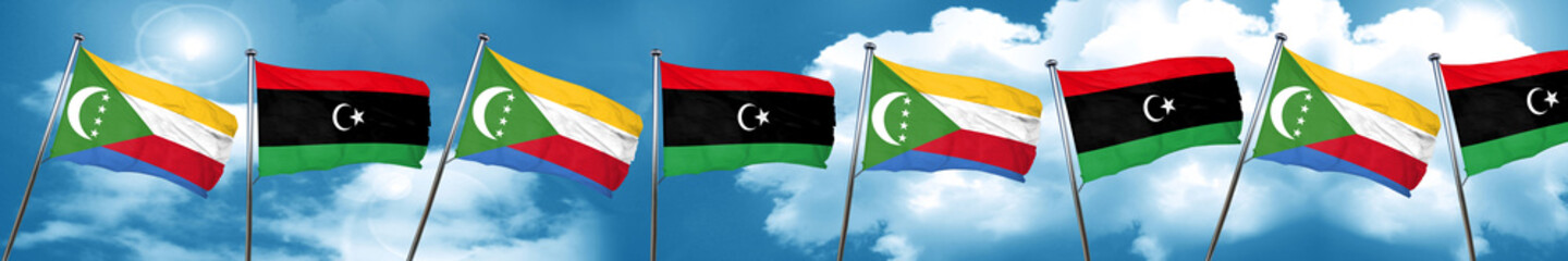 Comoros flag with Libya flag, 3D rendering