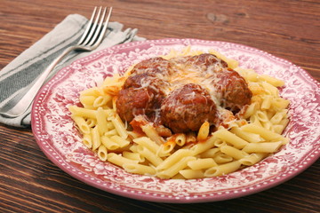 Meatballs with pasta on the plate