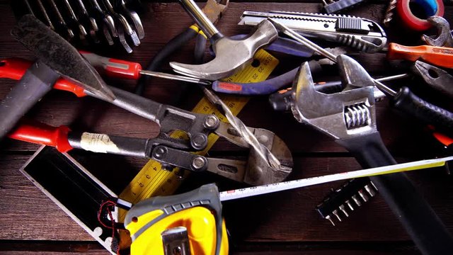 Many old rusty tools on repairman desk