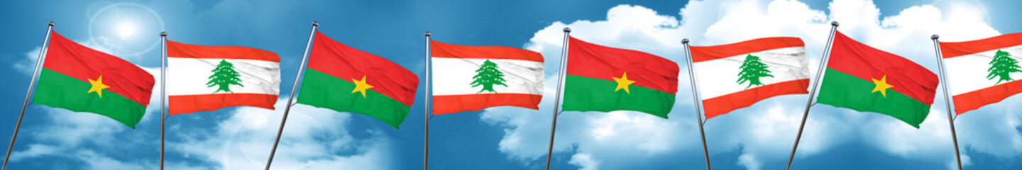 Fototapeta na wymiar Burkina Faso flag with Lebanon flag, 3D rendering