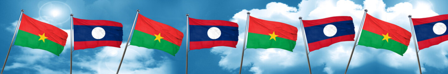 Burkina Faso flag with Laos flag, 3D rendering