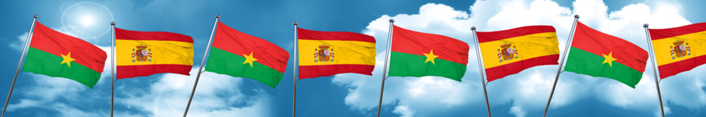 Burkina Faso flag with Spain flag, 3D rendering