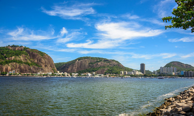 View of Morro da Urca, residential Botafogo neighborhood and luxury Yacht Club located on the shore of Guanabara Bay in Rio de Janeiro, Brazil