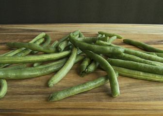 Green beans on wood