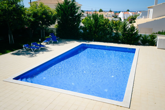 Blue waters. Luxury lifestyle with outdoors swimming pool background