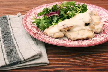 Chicken breast with cream sauce and green