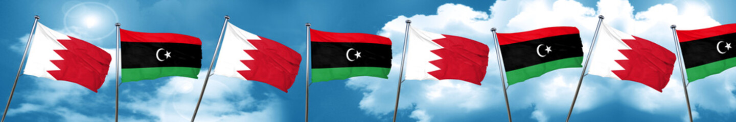 Naklejka na ściany i meble Bahrain flag with Libya flag, 3D rendering