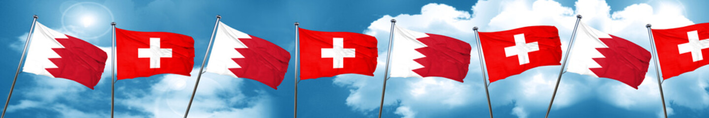 Naklejka na ściany i meble Bahrain flag with Switzerland flag, 3D rendering
