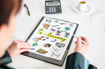 E-learning concept on a clipboard