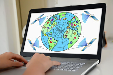 Global web network concept on a laptop screen