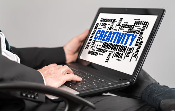 Creativity word cloud concept on a laptop