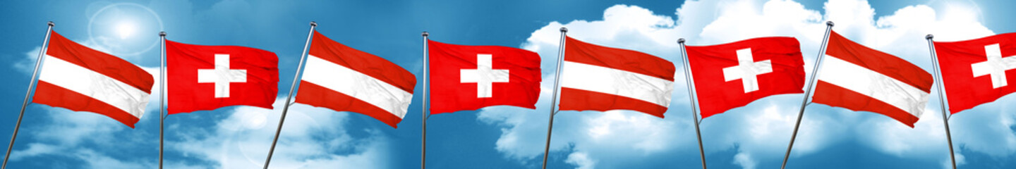 Austria flag with Switzerland flag, 3D rendering