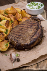 Rustic grilled beefsteak with french fries