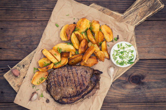 Rustic grilled beefsteak with french fries