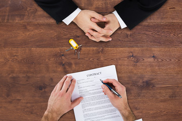 Businessman Filling Contract Form