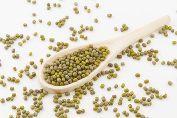 Mung bean on wood and isolated on white background
