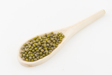 Mung bean on wood and isolated on white background
