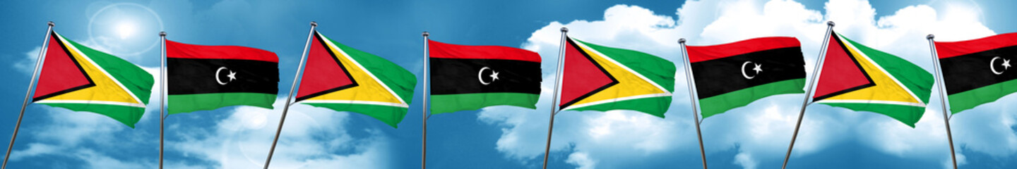 Guyana flag with Libya flag, 3D rendering