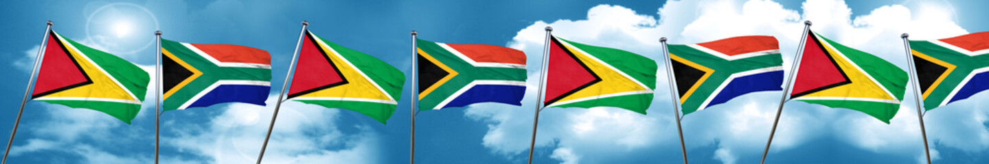 Guyana flag with South Africa flag, 3D rendering
