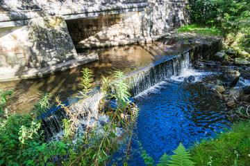 Fototapeta premium Brook and Waterfall, Summer, blue water, Forest Of Bowland, Lancashire, England, UK