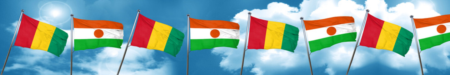 Guinea flag with Niger flag, 3D rendering