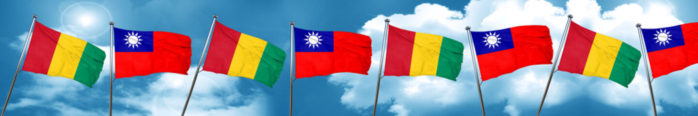 Guinea flag with Taiwan flag, 3D rendering