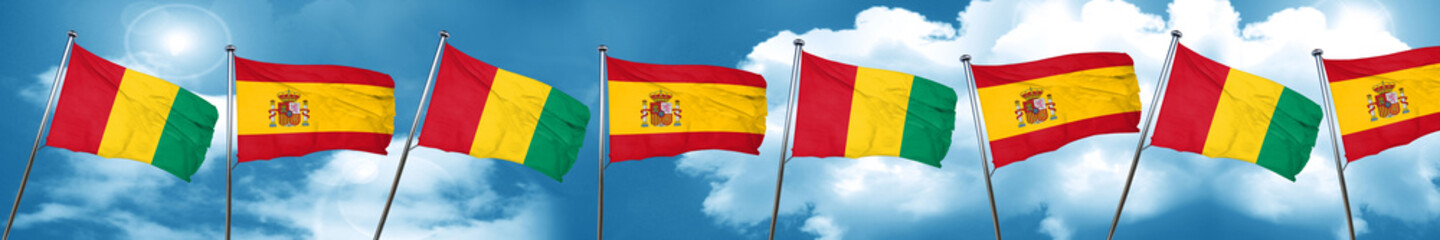 Guinea flag with Spain flag, 3D rendering